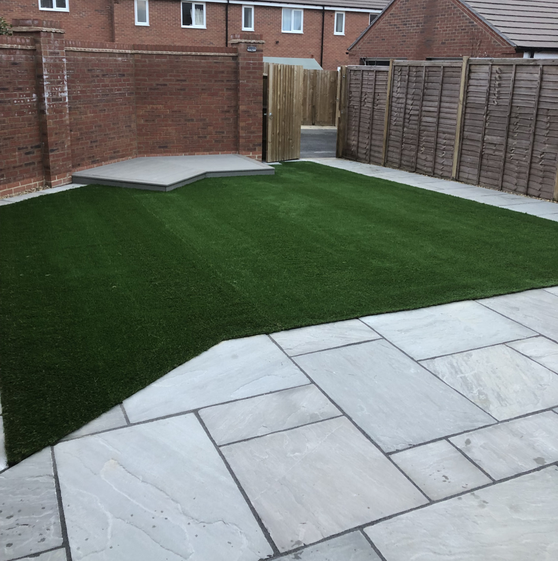 Artifical Lawn with Slate Grey patio surround